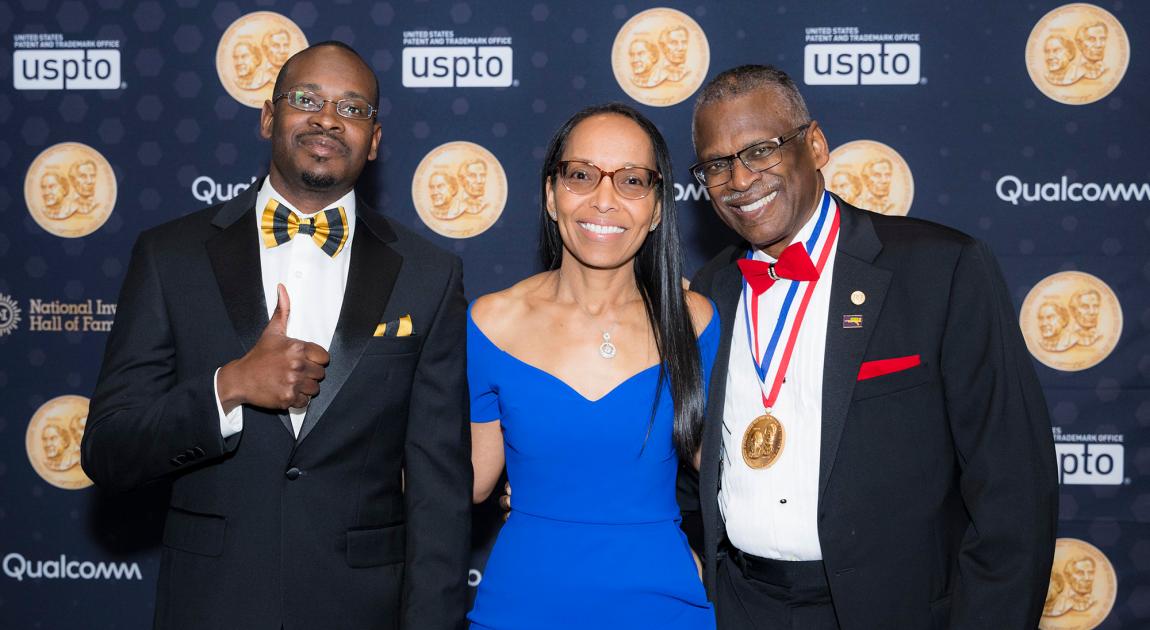 Lonnie Johnson pauses for a photo on the red carpet before attending the Induction Ceremony