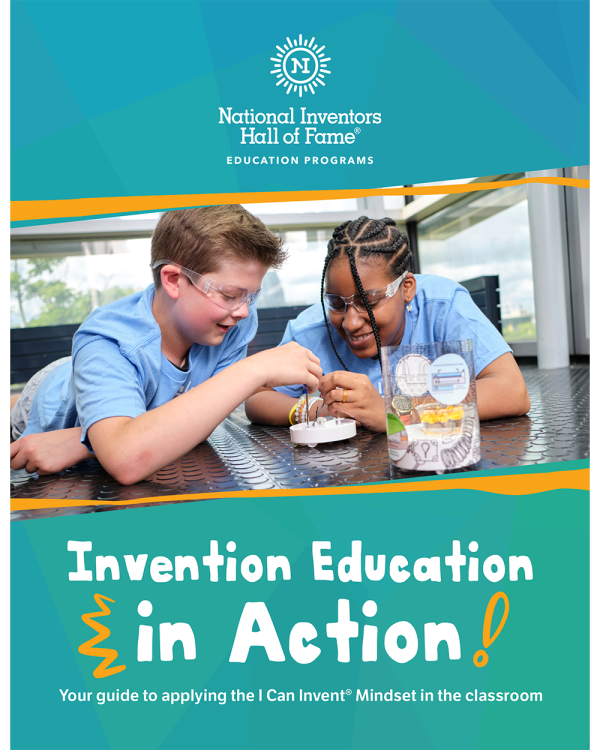 Two children work together to take apart a robot above the text "Invention Education in Action"